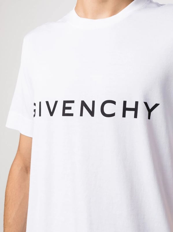 Logo-print cotton T-shirt from GIVENCHY featuring white, cotton, logo print at the chest, signature 4G motif, round neck, short sleeves and straight hem.