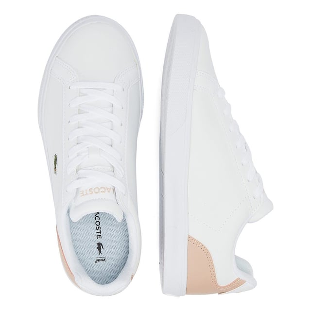 The Lacoste Lerond Pro BL23 1 CFA Women's White/Ltl Pink Trainers are crafted from high-quality leather and feature a clean white colorway with a subtle pop of light pink that adds a touch of playfulness. The design of the Lerond Pro BL23 1 CFA trainers is sleek and streamlined  with a low-cut profile that offers a modern look. The Lacoste crocodile logo is embroidered on the side of the shoe  adding a touch of brand recognition and flair. The shoe also features a cushioned insole for added comfort and support during prolonged wear. These trainers are versatile and suitable for a range of occasions  from casual outings to more formal settings. They can be paired with a variety of outfits  from jeans to dresses  to add a touch of sports-inspired style.