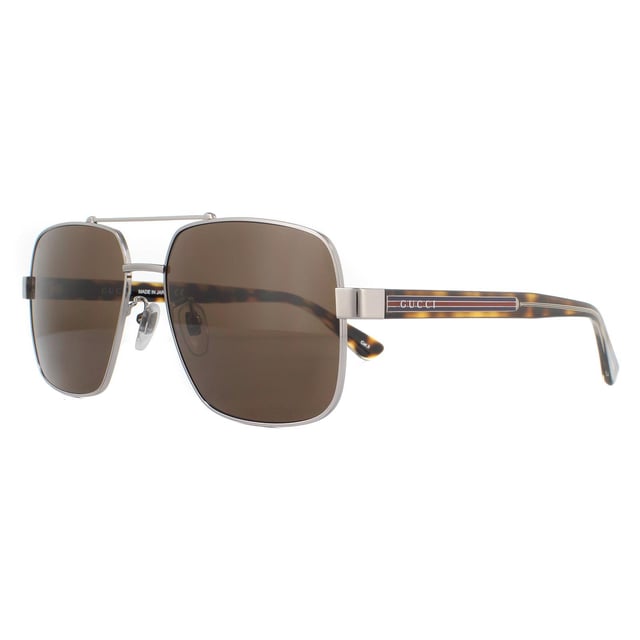 Gucci Sunglasses GG0529S 002 Ruthenium Havana Brownare a square aviator style with the typical double bridge look and sleek acetate temples with the Gucci logo and brand colour stripes.
