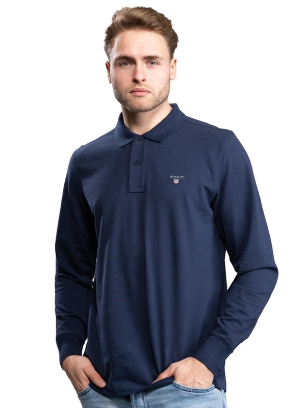 Gant Mens Designer Long Sleeve Polos feature the brands Logo, a Button-Down Collared Neckline. Crafted With 100% Cotton, these Lightweight and breathable Regular Fit Polos are Suitable for Casual or Workwear.