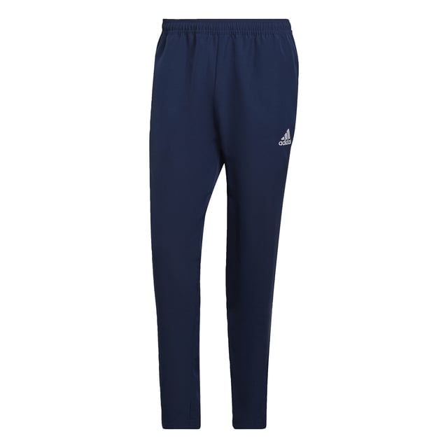 Part of the grassroots, football-focused Entrada 22 collection, these adidas pants were made to be seen. Clean and classic, they'll give your team a unified look on and off the pitch. Moisture-wicking AEROREADY keeps you comfortable. Ankle zips help you get them off quickly when it's time to do your thing.Made with 100% recycled materials, this product represents just one of adidas' solutions to help end plastic waste.  - This model is 186 cm and wears a size M. Their chest measures 99 cm and the waist 80 cm. - Regular fit with mid rise - Elastic waist with drawcord - 100% recycled polyester plain weave - Moisture-absorbing AEROREADY - Front zip pockets - Ankle zips  Shipped by adidas