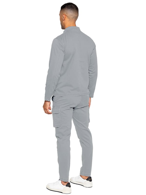 Enzo Mens Cargo Outfit Set. Long Sleeved, Zip Up, Collared, Cargo Overshirt. Two Front Flat Cargo Pocket With Velcro Fastening. Two Side Welt Pockets. Stitched Trims On Sleeves And Hemline. Set Completed With Cargo Trousers. Regular Fit, Straight Leg, Enzyme Wash. 5 Pocket Design. 2 Side Pockets, 2 Cargo Pockets With Velcro Fastening. Single Back Welt Pocket. Elasticated Waistband With Adjustable Drawstring