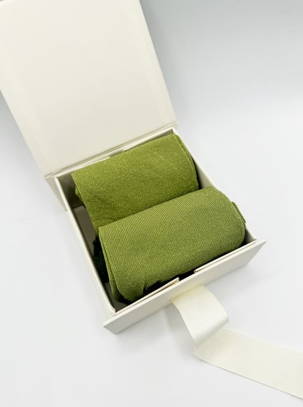 Green Glitter Socks by SVNX. Perfect for the gifting season! Treat yourself or someone special to this playful set of vibrant green glitter socks. With two pairs included, they're an easy way to add sparkle and fun to any outfit. Green Knitted Glitter Socks Set. One size. 2 pairs. Gift Box. Cotton/Polyamide/Elastane. Wash at 40. Made in China