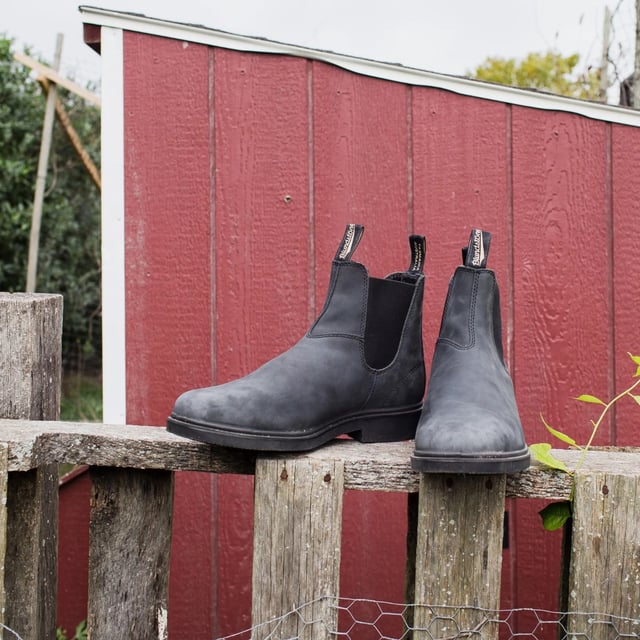 A combination of form, function and unbeatable comfort, the Blundstone 1306 Rustic Black Chelsea Boots are the ideal boot for the office, the woods and everywhere in between. Made from premium full-grain rustic black Nubuck Leather with a lean profile and chiselled square-toe, these boots ooze style. However, they remain Blundstone boots at heart, and come with Blundstone's SPS Max Comfort system for outstanding shock absorption and long-lasting comfort in addition to removable footbeds, allowing you to remain comfortable all day and ensure your Blundstone boots look the same after seasons of wear.Weekday or weekends, casual or formal, these Blundstone 1306 Chelsea dress boots are the perfect boot no matter the occasion.  Supple full grain black leather uppers that mould to your feet as you wear them Black elasticated sides and iconic pull tags for easy slip-on Double stitching and premium leather ensures long lasting durability Highly durable TPU outsole ensures excellent traction on all terrains and outstanding durability Blundstone SPS Max Comfort system and ergonomical toe-spring for superb comfort Cushioned midsole for all-day comfort Lightweight and comfortable