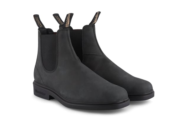 A combination of form, function and unbeatable comfort, the Blundstone 1306 Rustic Black Chelsea Boots are the ideal boot for the office, the woods and everywhere in between. Made from premium full-grain rustic black Nubuck Leather with a lean profile and chiselled square-toe, these boots ooze style. However, they remain Blundstone boots at heart, and come with Blundstone's SPS Max Comfort system for outstanding shock absorption and long-lasting comfort in addition to removable footbeds, allowing you to remain comfortable all day and ensure your Blundstone boots look the same after seasons of wear.Weekday or weekends, casual or formal, these Blundstone 1306 Chelsea dress boots are the perfect boot no matter the occasion.  Supple full grain black leather uppers that mould to your feet as you wear them Black elasticated sides and iconic pull tags for easy slip-on Double stitching and premium leather ensures long lasting durability Highly durable TPU outsole ensures excellent traction on all terrains and outstanding durability Blundstone SPS Max Comfort system and ergonomical toe-spring for superb comfort Cushioned midsole for all-day comfort Lightweight and comfortable
