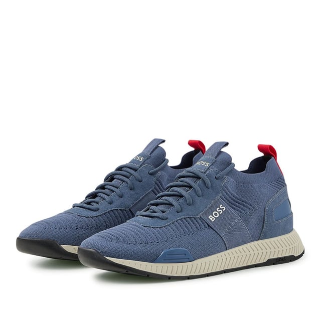 Mens BOSS Titanium Running Trainers in blue.- Stretchy knitted upper.- Lace up fastening.- Pull tabs on the collars and tongues.- Signature BOSS lettering to the heels  tongues and lateral sides.- Rubber sole.- Ref: 50470596-438