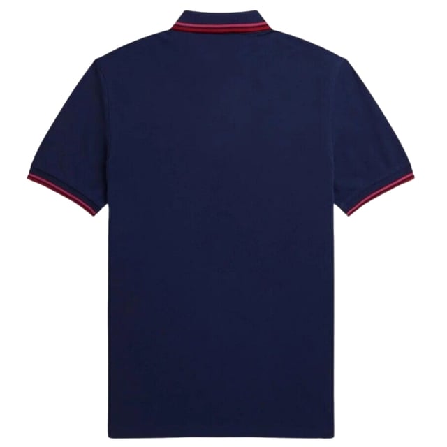 Fred Perry Blå pikétröja, mönster på krage, knäppning i nacken. 100 % bomull, kortärmad, blå polo