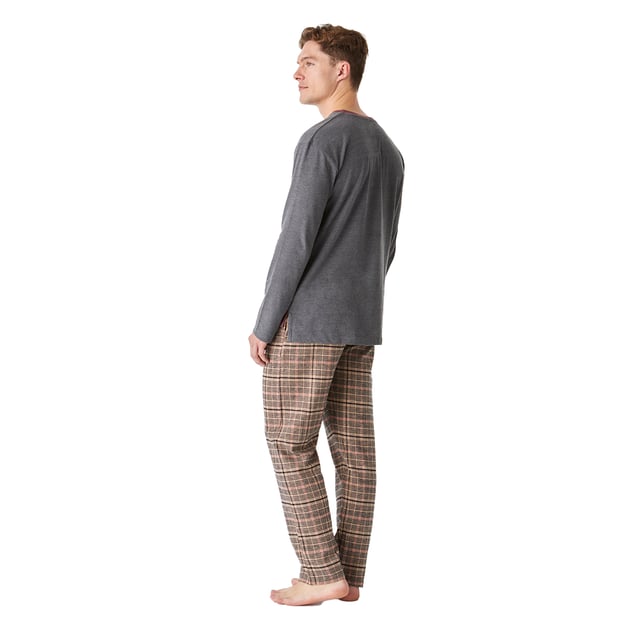 Elevate your nighttime comfort with our men's cotton pajamas, designed to give you an unparalleled sleeping experience.

 The shirt features long sleeves that offer warmth and comfort, ideal for cool nights. It also features a round neck with a medium button closure.

 The pants feature practical side pockets, perfect for carrying small items, and an adjustable elastic waistband with drawstring that ensures a personalized and comfortable fit.

 Made from soft cotton, these pyjamas combine functionality and style, making them the perfect choice for your relaxing moments at home.

 Enjoy a restful night's sleep and wake up refreshed every morning. Make your nighttime routine a real pleasure!
 Composition: T-shirt: 60% Cotton, 40% Polyester; Pants: 100% Cotton
 Care:
- Machine wash max 30ºC.
 - Short spin.
 - Do not use a dryer.
 - Iron max 110ºC.