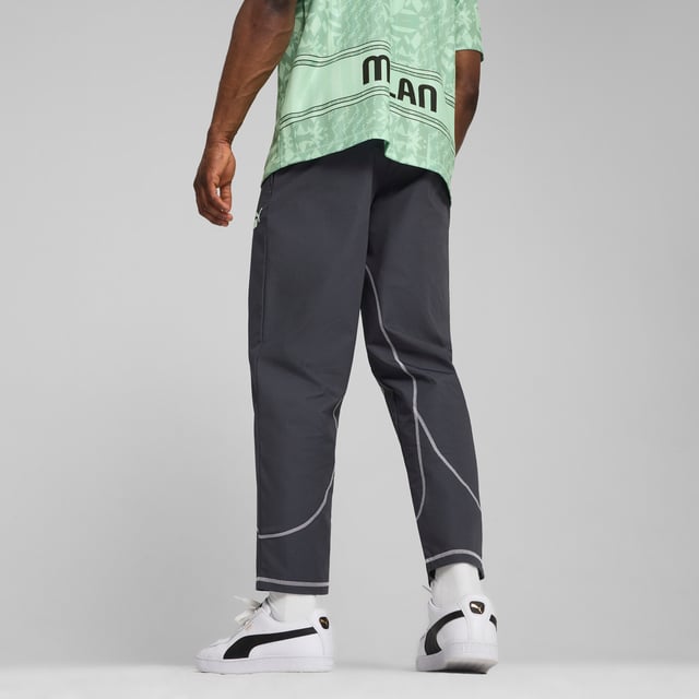 PRODUCT STORY: Inspired by football, designed for life, these track pants move with you. The AC Milan badge on the leg lets you show off your passion for the team, while ripstop material, smooth flatlock stitching and an elasticated waistband provide long-lasting comfort. DETAILS: Slim fit; 239 gsm, Ripstop with flatlock stitching; Medium rise; Elasticated waistband; Official team branding; Official team branding.  Our model is 186 cm tall and is wearing size M UK.