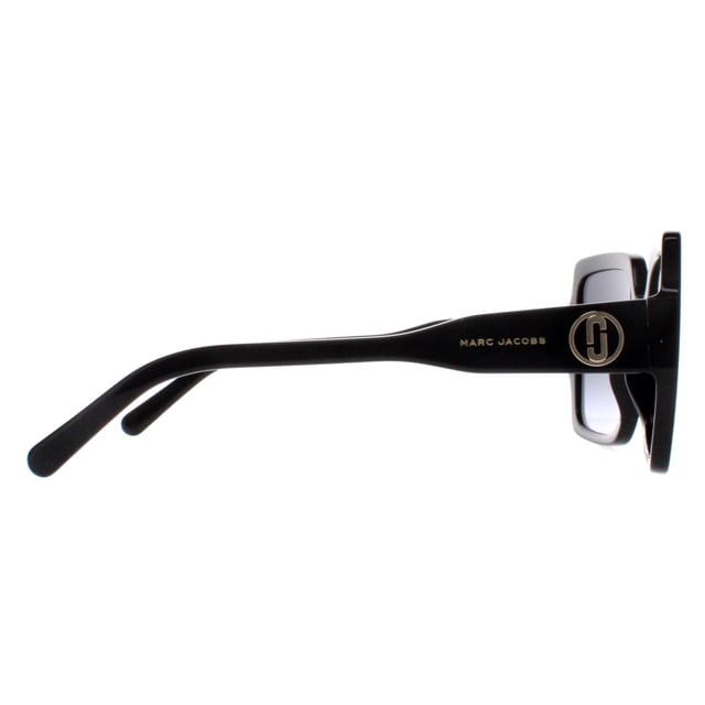 Marc Jacobs Cat Eye Womens Shiny Black Dark Grey Gradient MARC 731/S  Sunglasses are crafted with precision and finesse, the frame embodies a sleek yet distinctive silhouette, showcasing premium materials that guarantee both durability and comfort. The lenses, known for their superior quality, offer not just a fashion statement but also optimal protection against harmful UV rays. Emblazoned with the signature Marc Jacobs detailing, these sunglasses encapsulate refined style and timeless appeal, making them a quintessential choice for those seeking to effortlessly elevate their look with a touch of luxury and sophistication.