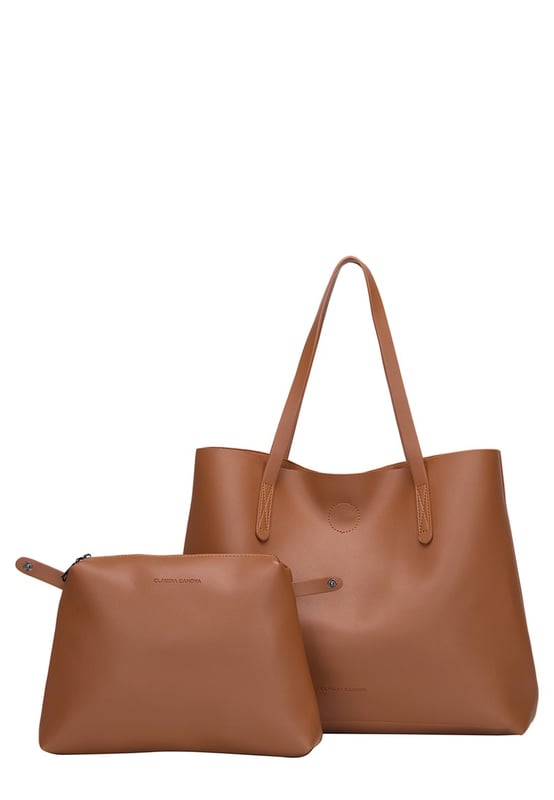 Let simplicity be key with the ophelia tote bag, perfect for taking your look through the week. In a range of colours this tote is made from unlined pu making it lightweight and spacious. With simple design features such as the claudia canova debossed logo, this bag is perfect for everyday sleek style. The bag fastens with a mag-dot clasp and inside reveals an inner pouch with a zip fastening to keep all your daily essentials safe. Features: , unlined pu, claudia canova debossed logo, mag-dot clasp fastening, twin grab handles, soft and flexible shape, removable inner pouch with zip fastening