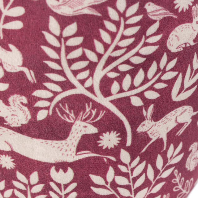 Take a trip to the Scandinavian woodland with this stunning doorstop. Featuring an intricate design of woodland animals from hares to foxes, intertwined with branches in a deep berry tone. This unique design is complemented with a plain velvet dye reverse and puts an ideal finishing touch to a Scandi-style or rustic interior.
