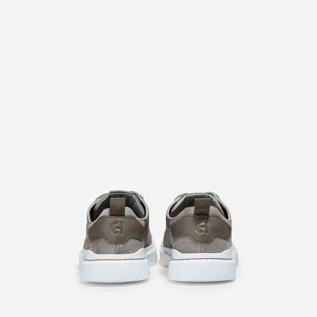We've given our much-loved, signature GrandPro Rally Court Sneaker an update in organic canvas. Crafted from high-end-yet-durable materials, it features a luxuriously cushioned GRANDFOAM footbed, an EVA outsole, and a classic old-school sneaker vibe
