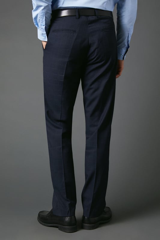 Slim fit design for a modern, tailored silhouette
        Distinctive windowpane check pattern adds visual interest
        Belt loops for versatile styling options
        Tapered leg for a sleek, contemporary look
        Suitable for smart casual to formal occasions
    
    These Burton slim fit trousers present a sophisticated option for the discerning gentleman. The windowpane check pattern introduces a subtle yet stylish element, perfect for those who appreciate classic designs with a contemporary twist. Ideal for smart casual events or more formal occasions, these trousers offer versatility in your wardrobe. Style them with a crisp button-down shirt and polished brogues for a refined office look, or pair with a lightweight jumper and smart trainers for a more relaxed weekend ensemble. The slim fit and tapered leg create a streamlined silhouette that's both flattering and on-trend, making these trousers a go-to choice for the modern man who values both style and comfort in his attire.