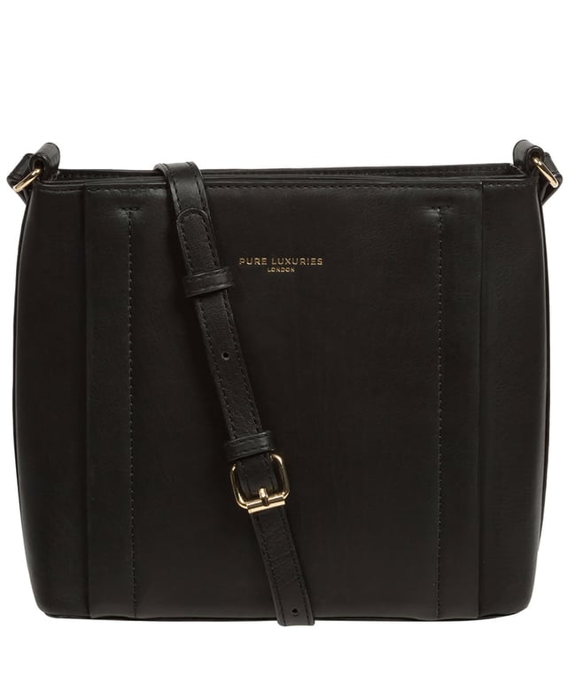 The 'Kali' cross body bag from Pure Luxuries London's Knightsbridge Collection is handcrafted from gold standard Nappa leather with a super-soft and smooth finish. The zip-over top opens to reveal a 100% cotton interior. The spacious compartment features four card slots to help maintain an organised bag. A slip pocket on the front of the bag provides on-the-go storage. Features gold-coloured metal fittings and zips alongside the adjustable slim leather strap with a maximum drop length of 65cm. The Pure Luxuries logo is embossed in gold foil for a beautifully simple finishing touch.