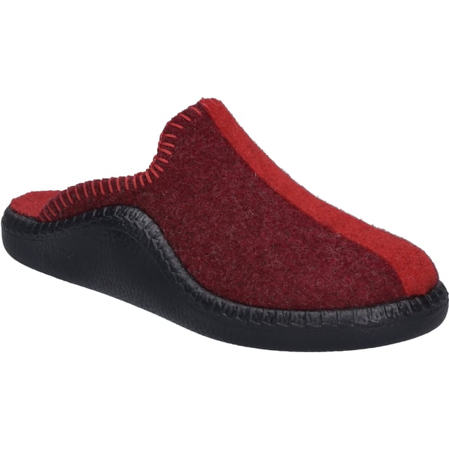 Entdecke den Monaco Damen 62 von JOSEF SEIBEL, einen Hausschuh, der Gemütlichkeit und Tradition in einem atemberaubenden bordeaux-kombi präsentiert. Dieser Schuh für Damen ist die perfekte Wahl für die Momente der Entspannung zu Hause, während der Herbstsaison. Gefertigt in der bewährten Direktbesohlungsmethode, bei der die schwarze PU-Sohle direkt in die Sohlenform eingespritzt wird und sich nahtlos mit dem aus Filz gefertigten Oberteil verbindet, bietet dieser Schuh eine unübertroffene Weichheit, Flexibilität und Leichtigkeit. Das Ergebnis ist ein Hausschuh, der sich durch seine Polyurethan-Sohle auszeichnet, welche für ihre ausgezeichneten Dämpfeigenschaften bekannt ist und dabei wesentlich leichter als Gummi ist. Der Monaco Damen 62 ist Teil der Relax-Kollektion von JOSEF SEIBEL, die für ihre Passformgarantie und erstklassige Qualität steht. Mit diesem Schuh erlebst du unvergleichlichen Tragekomfort, der dich durch alle Tätigkeiten im Indoor-Bereich begleitet, sei es beim Entspannen nach einem langen Tag oder beim Genießen der Freizeit mit Familie und Freunden. JOSEF SEIBEL setzt mit diesem Modell auf Slow Fashion, um eine nachhaltige Alternative in der schnelllebigen Modebranche zu bieten. Durch die Direktbesohlung und die hochwertigen Materialien ist der Monaco Damen 62 ein Paradebeispiel für langlebige Schuhe, die sowohl für den Hersteller als auch für den Träger von Bedeutung sind. Mit seinem einzigartigen bordeaux-kombi Farbton und der gemütlichen Ausstattung ist dieser Hausschuh ein Muss für jede Dame, die Wert auf Qualität, Komfort und Nachhaltigkeit legt.