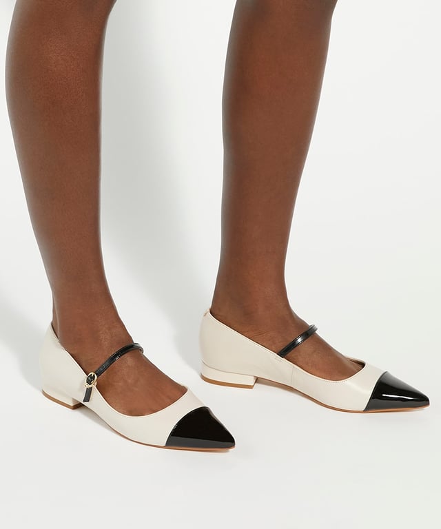 Our Hastie Mary Janes are a timeless style with a feminine twist. Boasting an elegant, pointed toe and an adjustable strap, these low-heel flats are sure to be the perfect fit. Pair them with your favourite dresses or tailored trousers for a chic, versatile look.