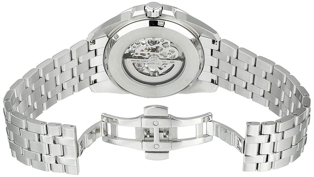 This Bulova Classic Automatic Analogue Watch for Men is the perfect timepiece to wear or to gift. It's Silver 43 mm Round case combined with the comfortable Silver Stainless steel watch band will ensure you enjoy this stunning timepiece without any compromise. Operated by a high quality Automatic movement and water resistant to 10 bars, your watch will keep ticking. Stylish- Sporty and a modern design, with its silver and blue skeleton dial is very suitable for men -The watch has a function: Luminous Hand High quality 21 cm length, 20 mm wide Silver Stainless steel strap with a Deployment clasp Case diameter: 43 mm, Case height: 12 mm and Case color: Silver Dial color: Silver