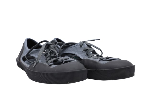 VINTAGE, RRP AS NEW
Lanvin takes innovation to the next level.  These sneakers made of canvas features an open side for a more breathability.  This elaborately constructed shoe stands for it's unique style.  Wear a funky pair of socks with this shoe to be fun and to have an eccentric style. 
Lanvin Open Low-top Sneakers in Grey Canvas
Condition: Very Good
Sign of wear: Wear on the soles
Material: Canvas/Rubber
Color: grey
Size: UK6/US7/40
SKU: 127105