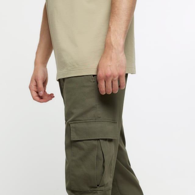 Slim fit, Utility pockets, Cuffed hem, Elasticated waist, Our model wears a UK 32 regular and is 186.5cm/6'1.5'' tall, Cotton for this product has been responsibly sourced, Cool Iron, Do Not Bleach, Do Not Dry Clean, Do Not Tumble Dry, Machine Wash 30C Gentle