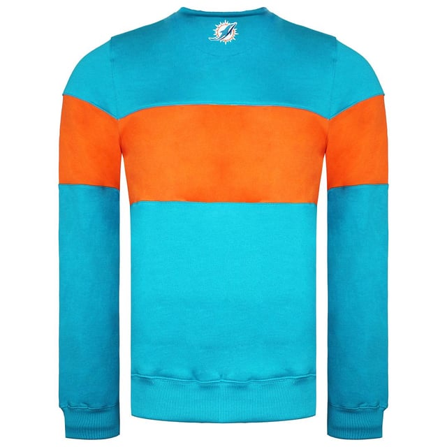 El jersey Fanatics NFL Miami Dolphins Paneled para hombre es un jersey elegante y cómodo diseñado para los seguidores del equipo de fútbol americano Miami Dolphins de la NFL. Estas son algunas de las características y detalles clave de este jersey:

 Mercancía oficial de la NFL:  Este jersey es un producto con licencia oficial de la NFL, lo que garantiza su autenticidad y calidad.

 Logotipo y colores del equipo:  El jersey suele llevar el logotipo y los colores del equipo de los Miami Dolphins, lo que permite a los aficionados mostrar con orgullo su apoyo al equipo.

 Diseño con paneles:  El diseño de paneles añade un toque elegante y deportivo a la apariencia del jersey, haciéndolo adecuado para días de partido, ropa informal o actividades al aire libre.

 Tejido cómodo:  El suéter está típicamente hecho de materiales cómodos que te mantienen caliente y acogedor durante el clima más frío.

 Uso versátil: Este jersey es adecuado para varias ocasiones, como asistir a partidos de fútbol, ver partidos o simplemente mostrar el orgullo por el equipo en la vida cotidiana.

 Fácil de cuidar:  La limpieza y el mantenimiento del jersey suelen ser sencillos, ya que normalmente se puede lavar a máquina, lo que lo convierte en una opción práctica para los aficionados.

 Disponible en varias tallas:  Fanatics suele ofrecer una gama de tallas para garantizar un ajuste cómodo a los aficionados de diferentes tipos de cuerpo.

El jersey Fanatics NFL Miami Dolphins Paneled para hombre es una gran elección para los aficionados de la NFL que buscan apoyar a los Miami Dolphins con estilo y comodidad. Tanto si vas al estadio a ver un partido como si quieres mostrar tu orgullo por el equipo en tus actividades diarias, este jersey te proporcionará calidez y espíritu de equipo.