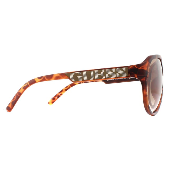Las gafas de sol Guess GU6729 S57 Tortoise Brown Gradient son una montura de alta calidad hecha de plástico con forma de mosca y están diseñadas para hombres