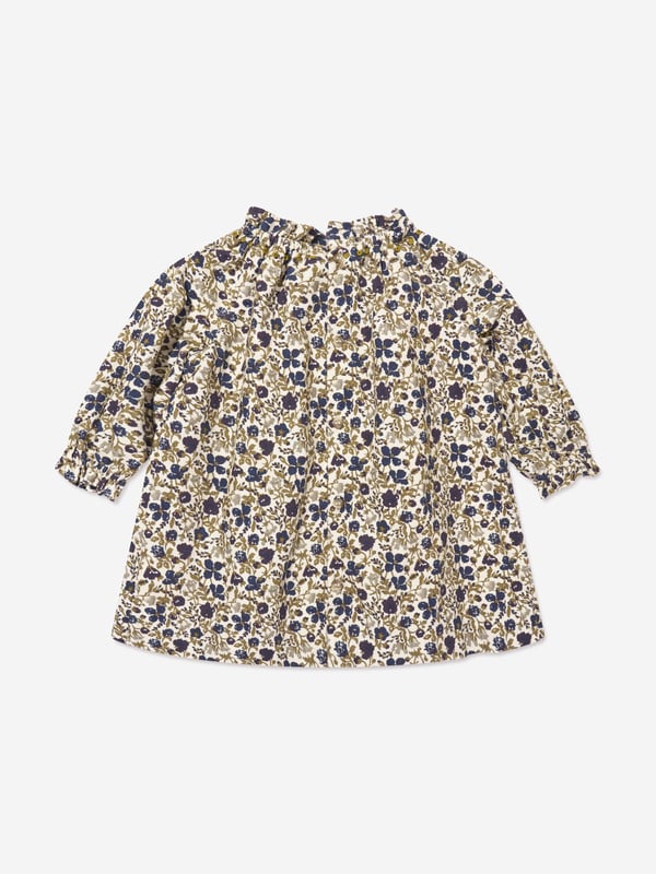 Bonpoint embody mesmeric concepts in their sophisticated aesthetics. This baby girls dress captures the French label's dedication to high quality and impeccable construction. Made in a beautiful velvet print with midnight blue patterning. It is complete with a ruffled collar and trims. She will look and feel divine.  Bonpoint Cherry Tag  Ruffled Collar/Trims Back Button Fastening  Elasticated CuffsBonpoint : Baby Height NB: 19" / 50cm 1M: 21" / 54cm3M: 23"/ 60cm 6M: 26"/ 67cm12M: 29"/ 74cm 18M: 31"/ 81cm 2Y: 33"/ 86cm