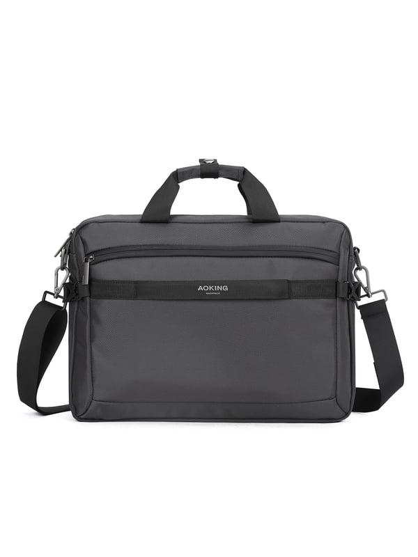 Bolso unisex. El cierre es con cremallera. Los bolsillos internos son bolsillos multifuncionales. Los bolsillos externos son dos delanteros con cremallera y uno trasero con cremallera. La bandolera es ajustable y extraíble en tejido. El asa es de tela. Hay tres compartimentos internos. El material exterior es poliéster. Internamente está forrado en poliéster. Medidas: 40,5x10x29 cm. Producto de moda