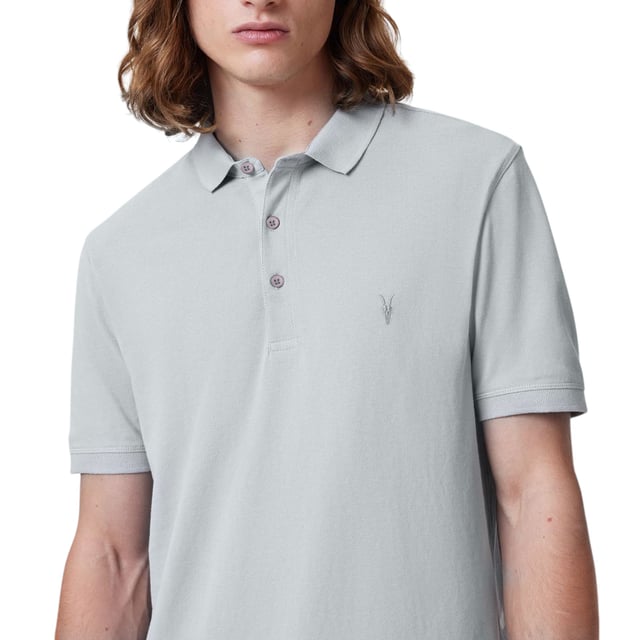 All Saints Men’s Pique SS Polo Shirts
Style Name: Reform
Style Code: M075PB
100% Cotton
Made In India
Slim Fit
3 Button Placket
Ramskull Logo to the Chest
Knitted Rib Collar And Cuffs
Short Sleeve
Casual Wear, Comfort Fabrics
Soft And Breathable
Machine Washable