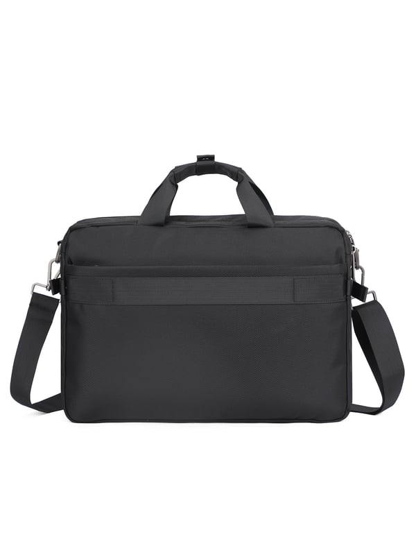Bolso unisex. El cierre es con cremallera. Los bolsillos internos son bolsillos multifuncionales. Los bolsillos externos son dos delanteros con cremallera y uno trasero con cremallera. La bandolera es ajustable y extraíble en tejido. El asa es de tela. Hay tres compartimentos internos. El material exterior es poliéster. Internamente está forrado en poliéster. Medidas: 40,5x10x29 cm. Producto de moda