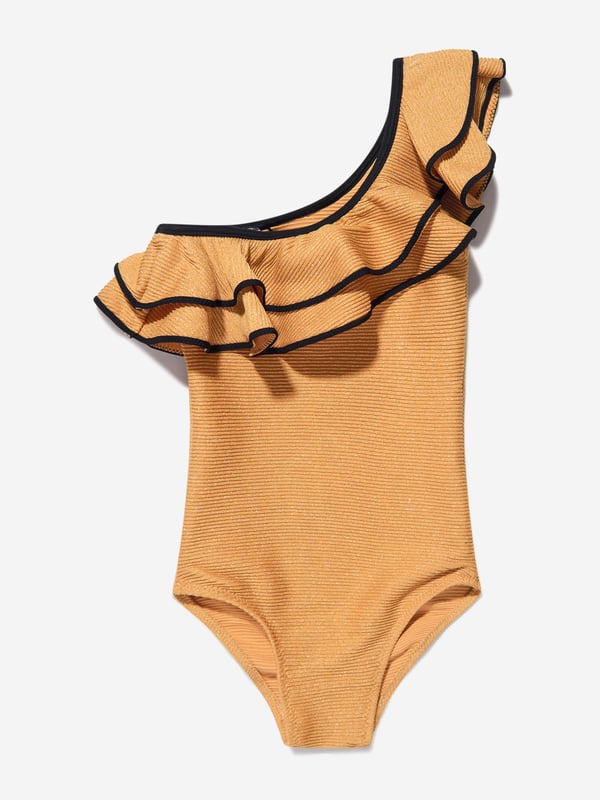 Nessi Byrd embody modern properties in their beautiful luxury resortwear. This girls Eliza swimsuit is reflective of the New York label's passion for vibrant aesthetics with an innovative twist. Crafted in a one-shoulder design with elegant ruffle detailing via a special glittered effect.Elasticated 80% Polyamide 20% Elastane