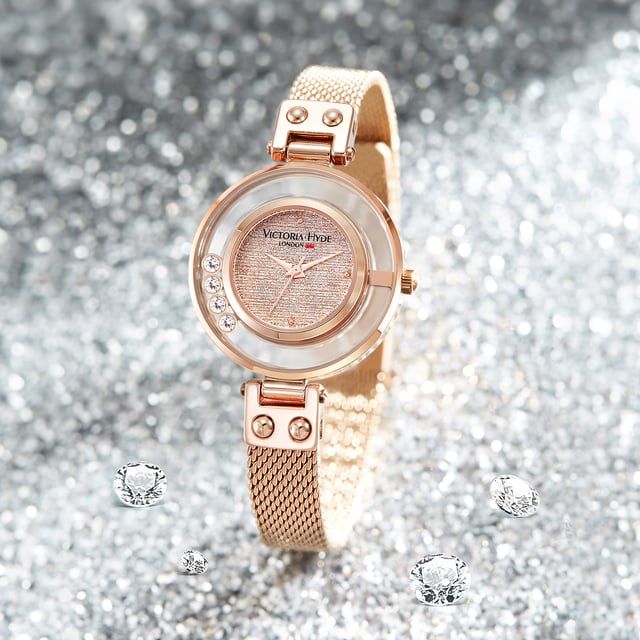 Pretty and Elegant Watch: The beautiful dial with small face is suitable for women's small wrists. Watch dial is also decorated with four clear crystals that makes this watch looks stylish, and elegant.

Case diameter: 30mm; Case thickness: 7.4mm;  Watch band length: 180mm; width: 10 mm

Slim Leather Band: Strap width:10mm, which is breathable and durable, provide comfortable wearing experience for you.

Quartz Women Watch: Japanese quartz movement, keep time accurately.

Waterproof Watch Women: 30M Waterproof,will withstand splashes in water, but not suitable for swimming or bathing.

Gifts for Her: It comes with nice Victoria Hyde gift box, can be as mothers day gifts, anniversary gifts, birthday present etc.