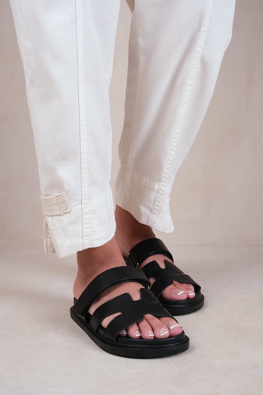 Black and white strappy sandals top