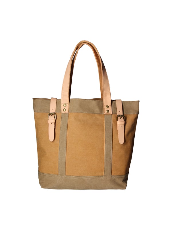 Bolso de mano de mujer de un compartimento en lona y piel genuina. Producto artesanal