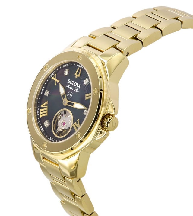 This Bulova Marine Star Analogue Watch for Women is the perfect timepiece to wear or to gift. It's Gold 36 mm Round case combined with the comfortable Gold Stainless steel watch band will ensure you enjoy this stunning timepiece without any compromise. Operated by a high quality Automatic movement and water resistant to 10 bars, your watch will keep ticking. This high quality watch is an incredible eye-catching Women's watch. This Analogue watch has a function: Luminous Hands High quality 19 cm length and 17 mm width Gold Stainless steel strap with a Deployment clasp Case diameter: 36 mm,case thickness: 10 mm, case colour: Gold and dial colour: Mother of pearl