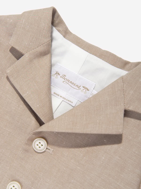 The Baby Boys Linen Leopold Blazer in Brown by Bonpoint is the ideal addition to your young one's wardrobe this Eid. Below are the defining features:Exquisite Design: With a unique print, this blazer makes a dashing statement, striking the right balance between trendy and timeless.Superior Comfort: Crafted from premium linen, it ensures your baby stays cosy and comfy, enhancing their festive experience.Elevate their attire with this linen blazer, adding a touch of luxury and elegance. Be the first to grab this must-have Bonpoint piece and let your little one shine!