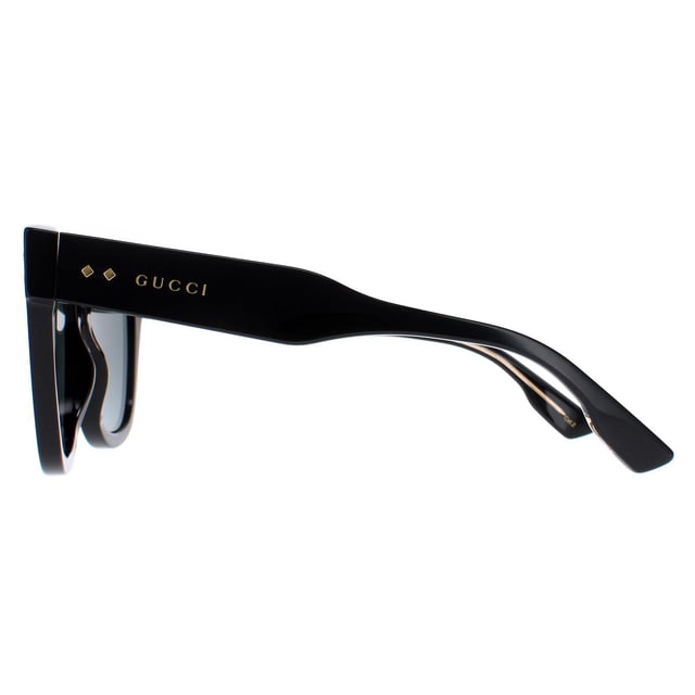 Gucci Aviator Mens Black Grey with Gold Gucci Pattern GG0900S  Sunglasses are a snazzy aviator frame that effortlessly complements any outfit. The frame is made from high-quality acetate, renowned for its durability and lightweight nature, ensuring a comfortable fit. Gucci's logo features on the temples for brand authenticity.