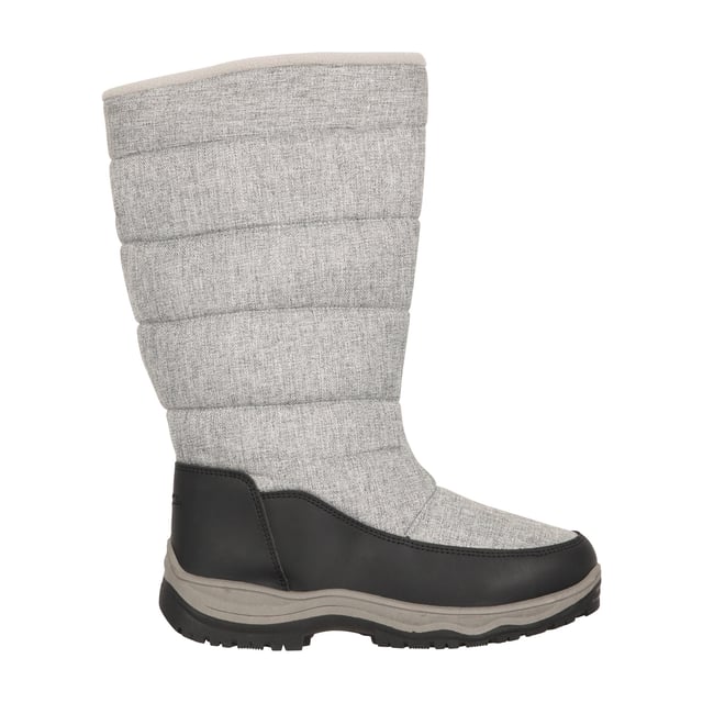 Upper: Durable, Textile, Water Resistant. Lining: Fleece, Insulating, Sherpa, Textile. Outsole: Synthetic. Fabric Technology: Snowproof. Flat Heel. Cut: Mid Calf. Design: Logo, Quilted. Toe Style: Round. Fastening: Side Zip, Slip-on.