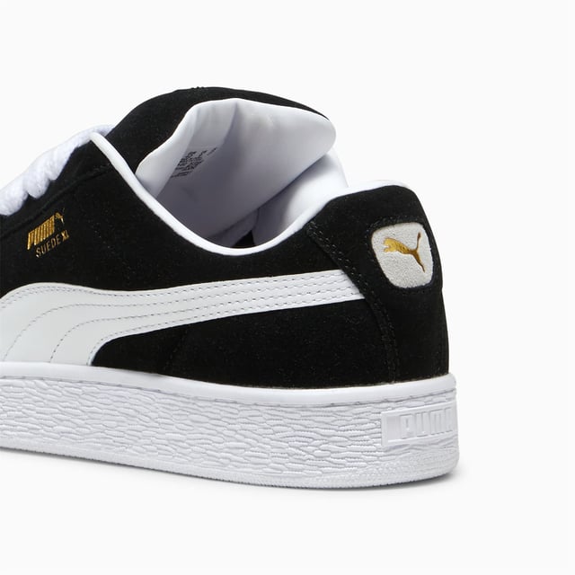 Sneakers featuring a premium suede upper for a sleek and stylish look. Debossed and foil-printed PUMA branding on the quarter panel adds a touch of sophistication. Finished with a durable rubber sole for reliable traction and comfort.