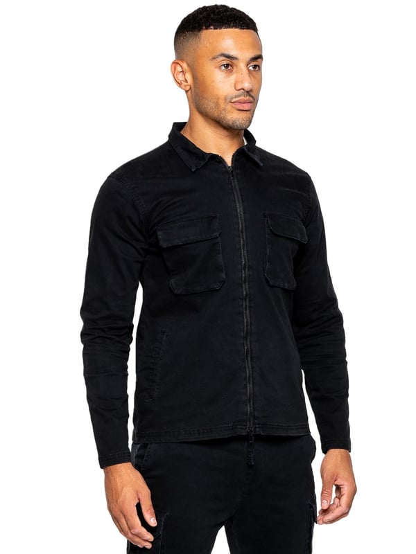 The Enzo cargo overshirt jacket features a long-sleeved, zip-up design with a collared neckline for a classic look. With two front flat cargo pockets and two side welt pockets, you'll have ample storage for all your essentials. The stitched trims on the sleeves and hemline add a touch of detail to this versatile piece.