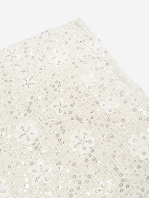 Introducing the exquisite Girls Sequin Embroidered Skirt in White from mama luma, a dazzling addition to any girl's wardrobe for AW2024! Here are the standout features that make it an essential:‚ Luxurious Design: Crafted with sparkling sequins &amp; delicate embroidery for an enchanting look.‚ Elegant White Hue: A pristine white colour that offers a sophisticated and timeless charm.‚ Premium Fabric: Constructed from top-tier materials ensuring comfort &amp; durability.‚ Versatile Style: Perfect for festive events or stylish everyday wear.Elevate your little one's fashion game with this stunning skirt by mama luma. Order now and let her shine like never before!
