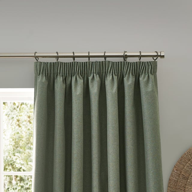 Transform your living space with Dawn Blackout Pencil Pleat Curtains, designed for those who value elegance and practicality. Crafted from soft-textured fabric with a modern marl effect, these curtains add refined style to any room while effectively blocking out light. Perfect for a restful night's sleep or creating the ideal movie-watching environment, their temperature-regulating properties ensure comfort year-round by keeping your home cool in summer and warm in winter. Enjoy the perfect blend of function and style with Dawn Blackout Curtains.