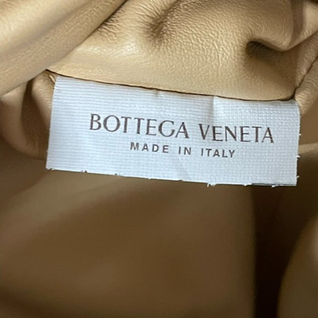 VINTAGE, RRP AS NEW
Make a bold statement with the Bottega Veneta Mini Pouch 20 Sling Bag in vibrant yellow calfskin leather. This sleek, compact bag showcases Bottega Veneta’s signature intrecciato weave pattern, adding a luxurious touch to its minimalist silhouette. The rich yellow hue offers a pop of color, while the soft calfskin leather exudes sophistication and durability. Designed for both style and function, the bag features an adjustable sling strap, making it easy to wear across the body or on the shoulder. Perfect for day-to-night transitions, this bag is an eye-catching accessory that elevates any look with ease and elegance.

Bottega Veneta Mini Pouch 20 Sling Bag in Yellow Calfskin Leather

Condition: Excellent
Signs of wear: No retail tag, No visible sign of wear., 
Packaging: Dust bag
Color: Yellow
Material: Leather | calfskin leather
Size: One Size | One Size
Measurements: Width: 40; Height: 140; Length: 210; Handle drop: 500; Strap length: 1040
SKU: NAPPUGBBA410171W
