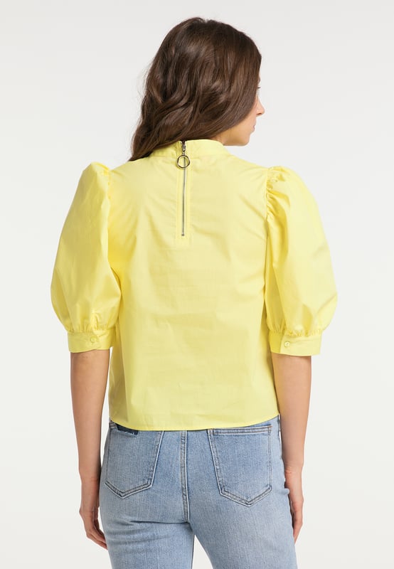 geen voering/geen voering, geen vulling  De pofmouwentrend uit de jaren 80 viert zijn stijlvolle comeback met deze blouse van myMo. De katoenen stof is aangenaam zacht tegen de huid. De pofmouwen met ingelegde plooien aan de mouwzoom harmoniëren met de knallende plooien aan de bovenkant en creëren een bobbelig silhouet. Een zilveren ritssluiting met een ronde rits maakt het gemakkelijk om aan te trekken en voegt een accent toe onderweg. In combinatie met jeans en laarzen creëer je een trendy look!  top