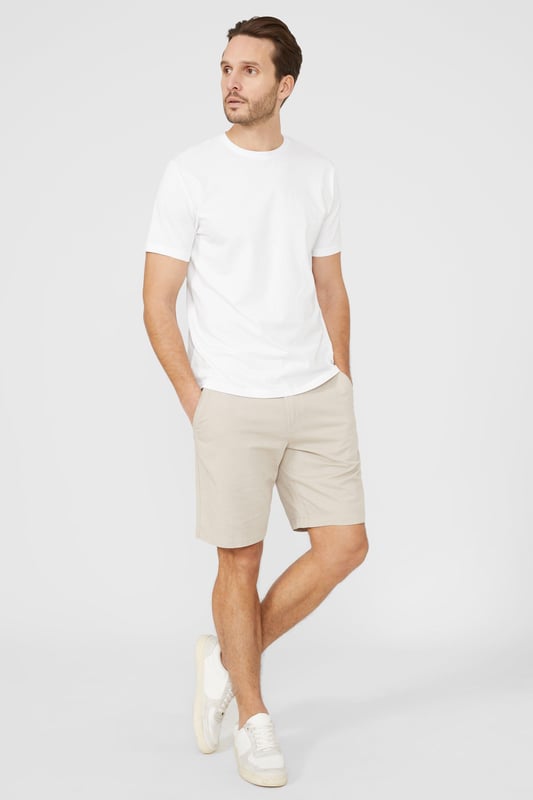 Cotton Crew Neck T-shirt. Consciously made from super-soft fabrics, look to this must-have crew T-shirt for men. Boasting short-cut sleeves, a comfortable neckline, and a tailored cut finish.
