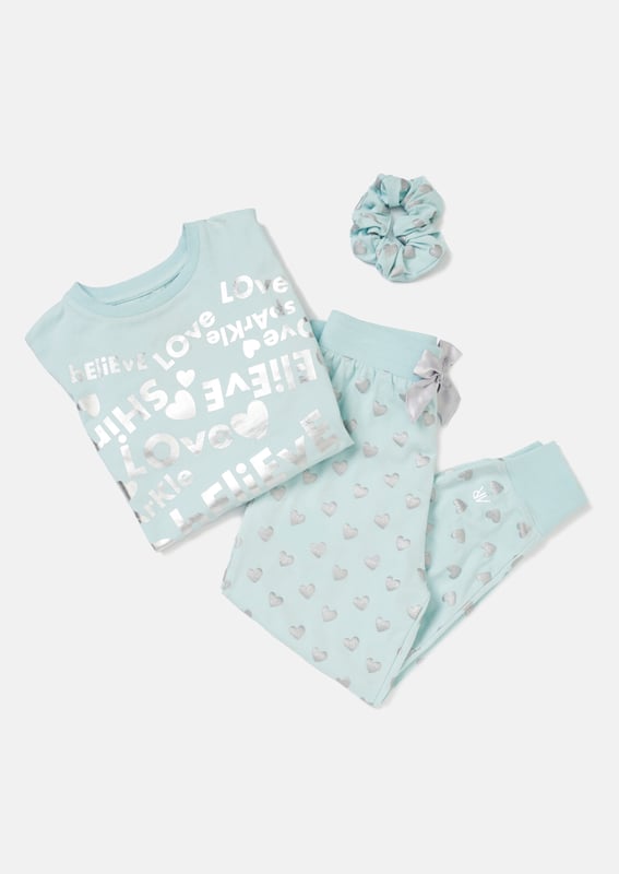 Perfect for your little dreamer. These super cute slogan print PJs in ice   are made in the softest jersey and come with a matching hair scrunchie. Ideal for gifting. We LOVE them!. About Me: 95% Cotton 5% Elastane. Look After Me: Think Planet. Wash At 30C.