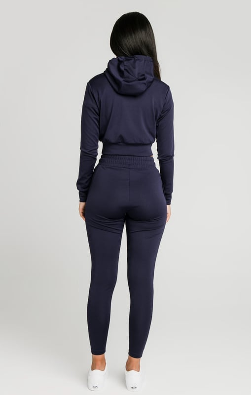 inchNavy Essential Track TopSoft touch fabricCropped lengthDrawstring hoodEmbroidered SikSilk logoLong sleevesStraight hemMachine wash95% Polyester 5% Elastane inch