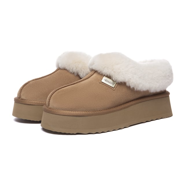 Stay snug and stylish in the timeless Topknot Ankle Slippers, the latest essential footwear with a trendy platform design. Crafted in five chic colour options, these slippers envelop your feet in luxurious sheepskin wool, offering irresistible comfort. Complete with a fluffy wool ankle collar, their enduring charm ensures they remain in vogue across seasons.

Product No. EAU2017

Description:
- Cow Suede Upper
Sheepskin Wool Insole and Lining
- EVA Sole