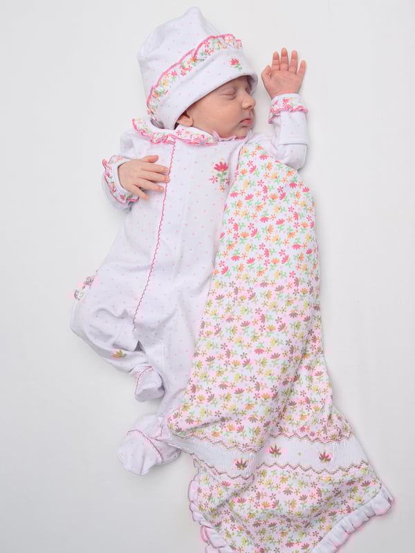 Magnolia Baby depict soft sophistication into their refined products. This baby girls pink babygrow ruffle footie design is reflective of the label's precision of beauty and intricate focus. Made in Pima cotton with ruffled trims, polka dot patterning and embroidered floral detailing. She will look and feel divine. Crew Neck  Brand Tag Polka Dot Patterning  Press Stud Fastening Long Sleeves  Ruffled Trims Pima Cotton  Embroidered Floral Detailing
