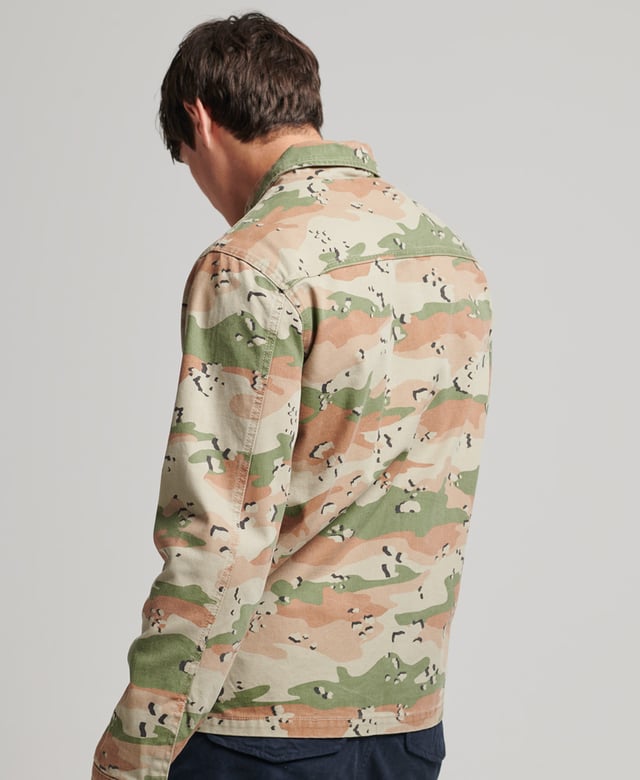 Inspired by the American Frontier, our Vintage Ranch Jacket takes those iconic cues into a contemporary style so you can embrace that retro vibe whilst staying true to your authentic self. Lightweight and finished with branded detailing, this jacket is the ideal transitional piece that will sharpen up any outfit.Relaxed fit – the classic Superdry fit. Not too slim, not too loose, just right. Go for your normal sizeSingle cord collarZip and button fasteningFour-pocket designButton cuffsInternal popper fastening pocketFully linedSignature Superdry patchBranded hardware